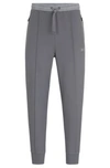 Hugo Boss Tracksuit Bottoms With Pixelated Details In Grey