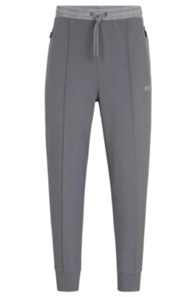 Hugo Boss Tracksuit Bottoms With Pixelated Details In Grey