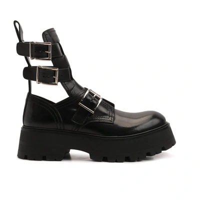 Alexander Mcqueen Rave Calfskin Buckle Loafer Boots In Black