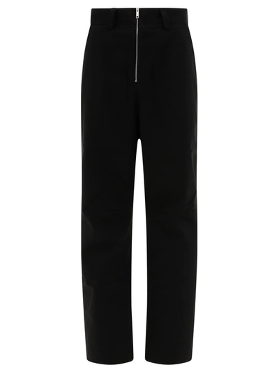 Ambush Logo Embroidered Zip Up Trousers In Black