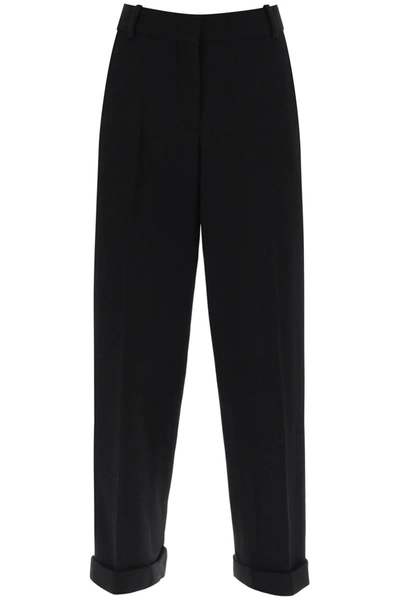 Balmain Cuffed Wool Crepe Trousers In Noir (black)