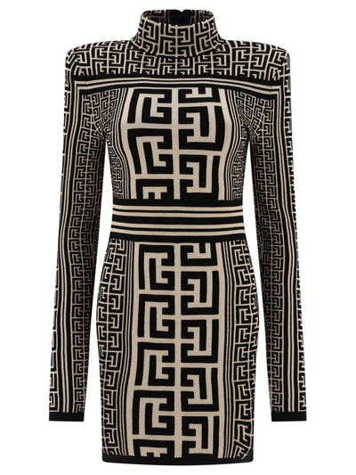 Balmain Dual Monogram Knit Mini Dress With Padded Shoulders In Black