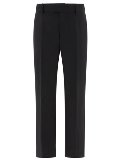 Dolce & Gabbana Technical Fabric Pants With Metal Dg Logo Trousers In Black
