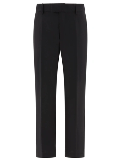 Dolce & Gabbana Technical Fabric Pants With Metal Dg Logo In Black