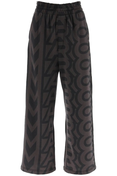 Marc Jacobs Monogram Printed Oversized Sweatpants In Brown