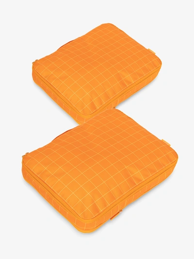 Calpak Large Compression Packing Cubes In Orange Grid