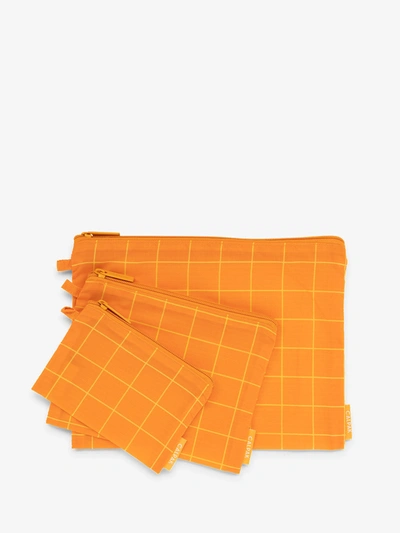Calpak Compakt Zippered Pouch Set In Orange Grid
