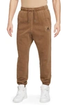 Jordan Flight Essentials Washed Cotton Fleece Sweatpants In Brown
