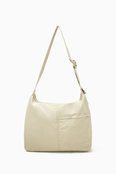 Cos Slouchy Nylon Messenger Bag In Beige