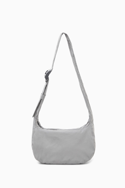 Cos Reflective Crossbody Saddle Bag In Silver