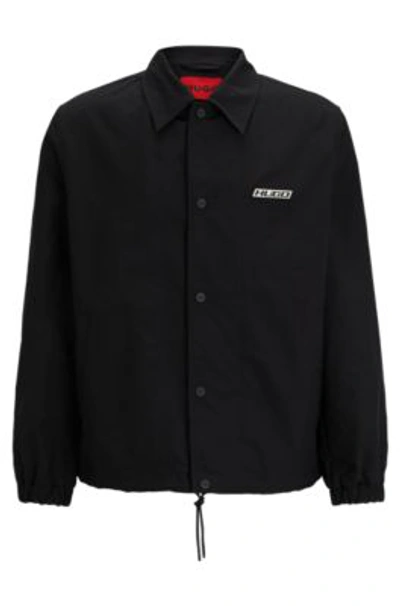 Hugo Water-repellent Coach Jacket With Logo Badge In Black