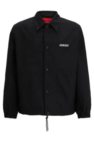 Hugo Boss Water-repellent Coach Jacket With Logo Badge In Black