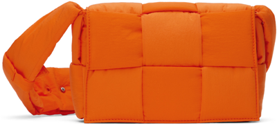 Bottega Veneta Orange Small Padded Tech Cassette Bag In 7508 Papaya