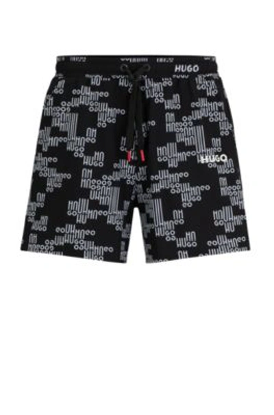 Hugo Fully Lined Swim Shorts With All-over Logos In Black