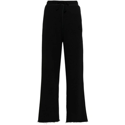 Ganni Trousers In Black