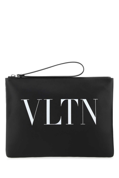 Valentino Garavani Valentino Logo Printed Zipped Clutch Bag In Black