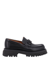 Ferragamo Chunky Sole Loafers With Metal Buckle Detail In Black
