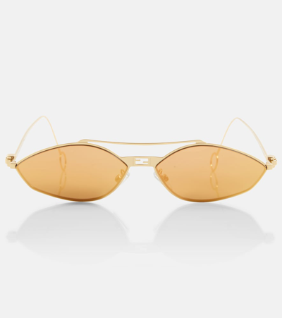 Fendi Oval Sunglasses In Gold