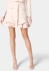 Shop Bebe Tailored Flounce Mini Skirt In Peach Whip