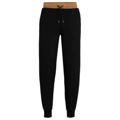 Hugo Boss Oversize-fit Organic-cotton Tracksuit Bottoms With Contrast Waistband In Black