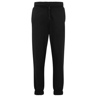Hugo Relaxed-fit Cotton-terry Tracksuit Bottoms With Stacked Logo In Black