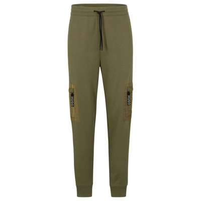 Hugo Relaxed-fit Tracksuit Bottoms With Cargo Pockets In Light Green