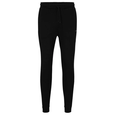 HUGO BOSS COTTON TRACKSUIT BOTTOMS WITH CURVED LOGO