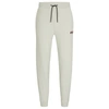 Hugo Boss Monogram-print Tracksuit Bottoms With Striped Tape In Light Green