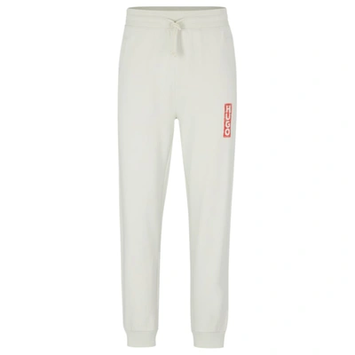Hugo Cotton-terry Tracksuit Bottoms With Vertical Logo In Light Green
