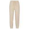 Hugo Relaxed-fit Cotton-terry Tracksuit Bottoms With Stacked Logo In Light Beige