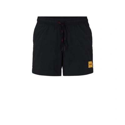 Hugo Boss Quick-dry Swim Shorts With Red Logo Label In Black