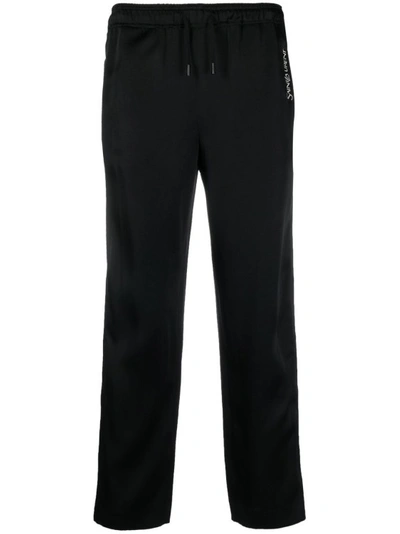 Saint Laurent Embroidered-logo Striped Track Pants In Black