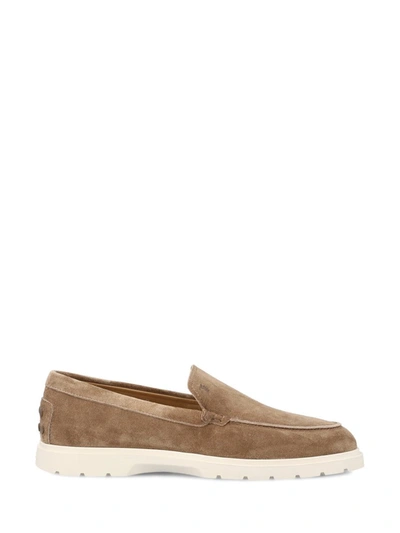 Tod's Logo Embossed Suede Loafers In Beige