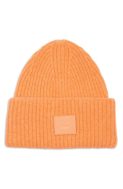 Acne Studios Pansy Face Patch Rib Wool Beanie In Mandarin Orange Melange