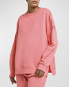 Moncler Logo Embossed Crewneck Sweatshirt In Open Red