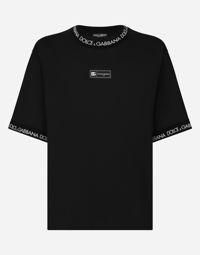 Dolce & Gabbana Short-sleeved Cotton T-shirt With All-over Logo In Black