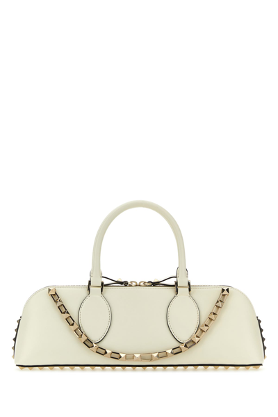 VALENTINO GARAVANI VALENTINO GARAVANI IVORY LEATHER ROCKSTUD EAST-WEST HANDBAG