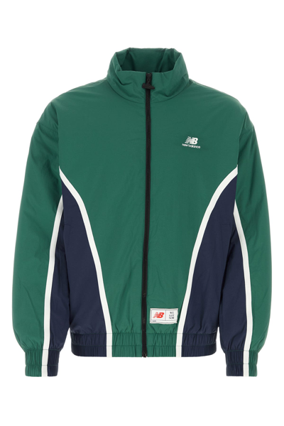 NEW BALANCE GIUBBINO IMBOTTITO IN NYLON BICOLOR UOMO