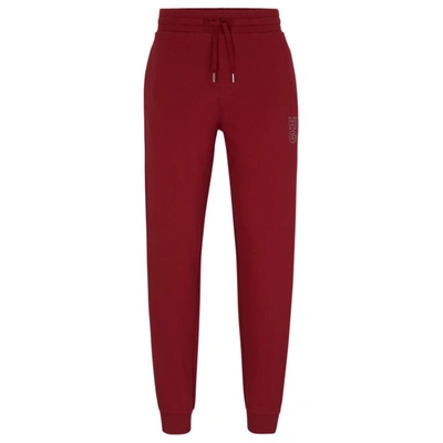 Hugo Boss Cotton-terry Tracksuit Bottoms With Metallic-effect Logo In Dark Red