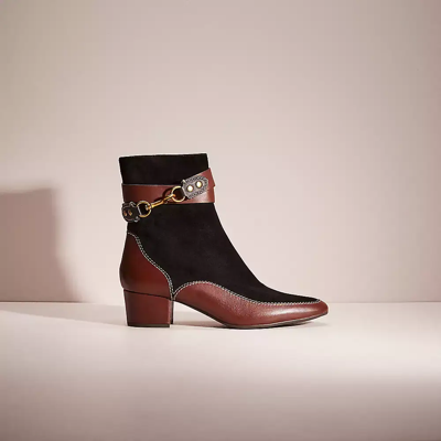 corrine bootie coach