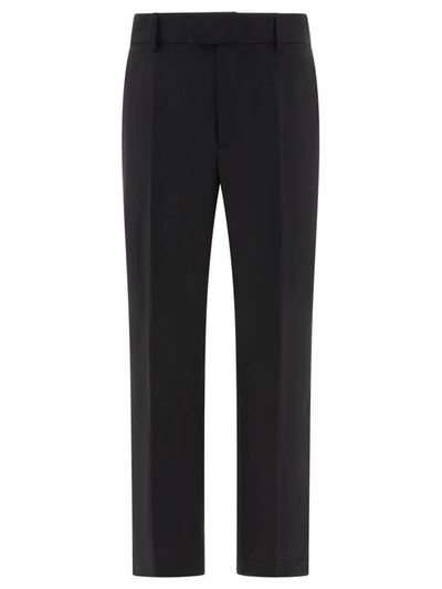 Dolce & Gabbana Technical Fabric Pants With Metal Dg Logo In Black