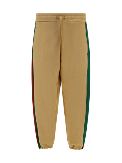Gucci Logo Embroidered Drawstring Track Trousers In Brown