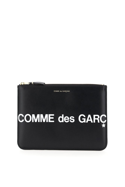 Comme Des Garçons Wallet Logo Printed Zipped Clutch Bag In Black