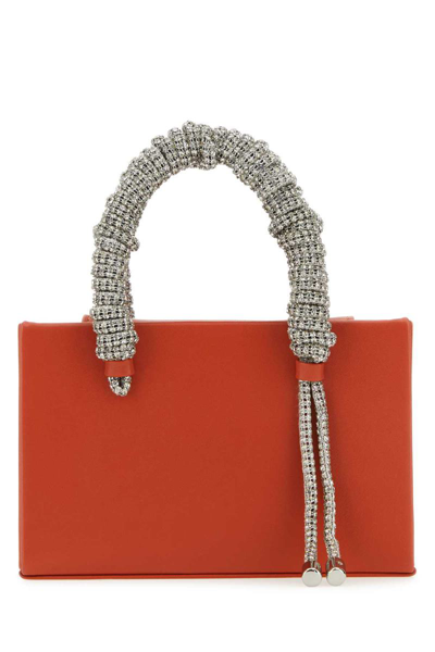 Kara Handbags. In Red