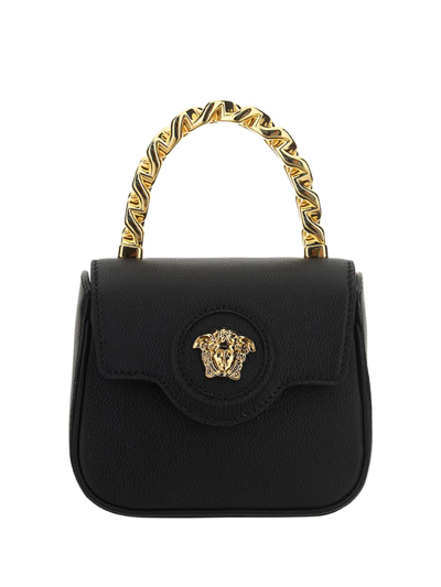 Versace Shoulder Bags In Nero/oro