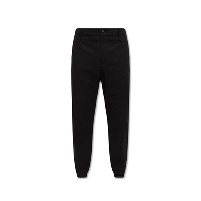 Alexander Mcqueen Pleat-front Trousers In Black