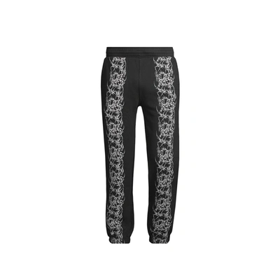 Givenchy Cotton Printed Trousers In Black