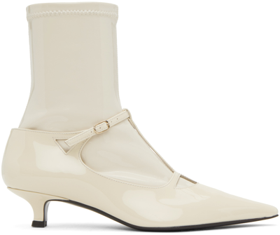 The Row Off-white Cyd Patent Leather Boots In Vanilla