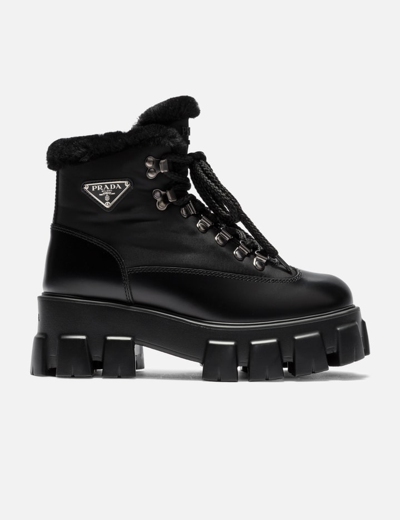 Prada Monolith Leather And Nylon Boots In Black