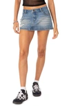 Edikted Distressed Low Rise Denim Miniskirt In Blue